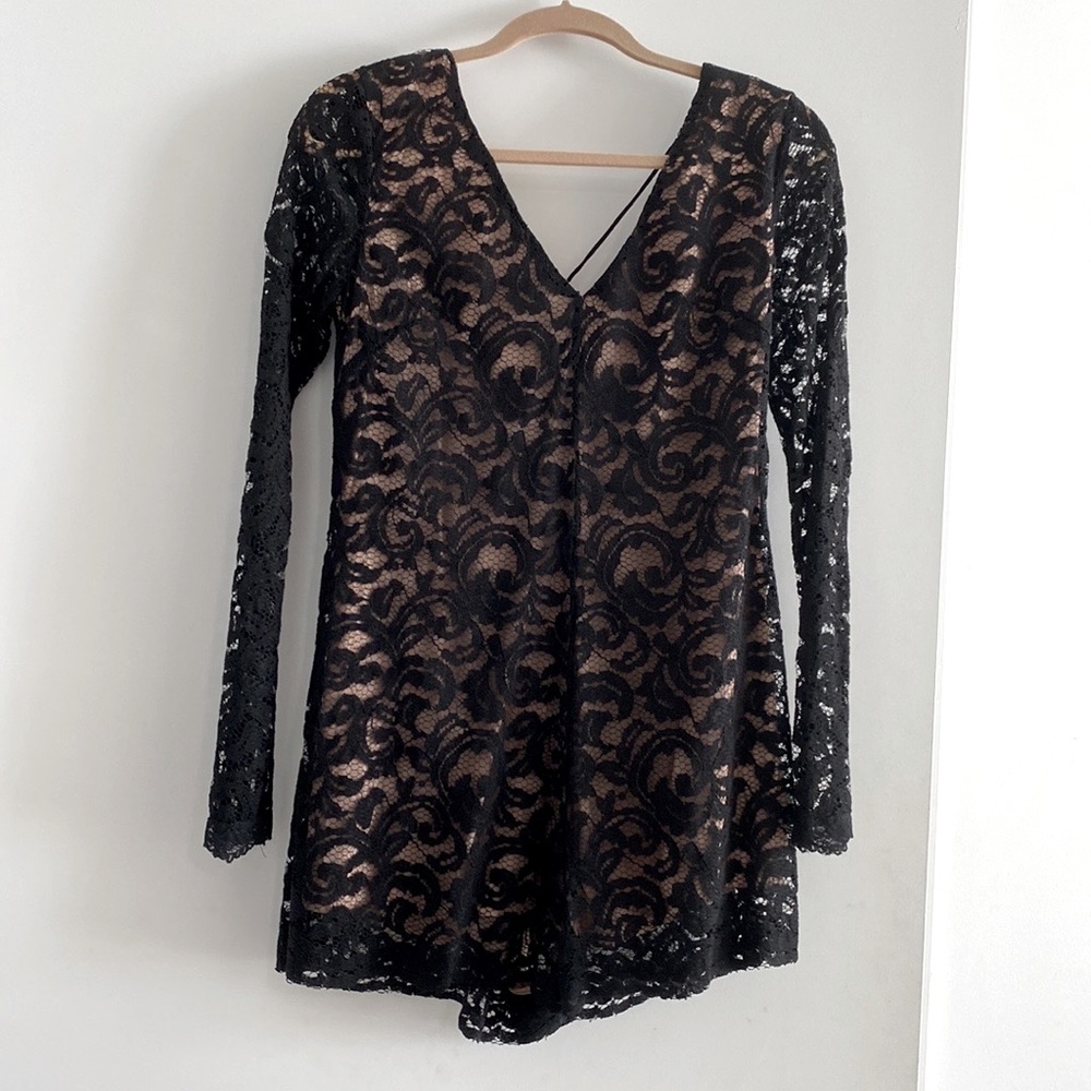 Lace romper perfect for New Years dinner and party.